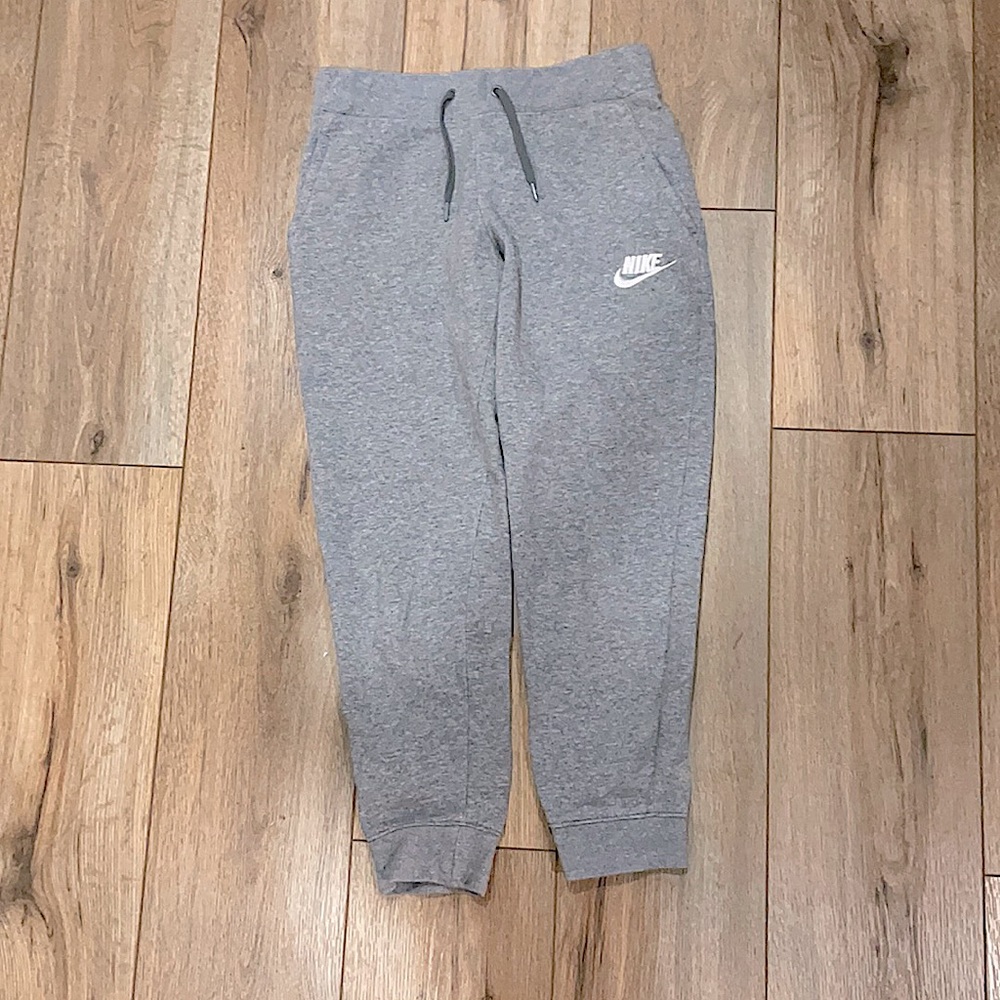 Nike grey sweatpants with embroidered white logo. Standard fit/medium. Girls